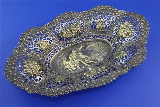 A late 19th/early 20th century continental 900 standard parcel gilt shaped oval dish, 11 oz.